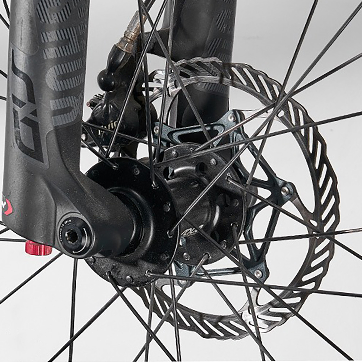 Aluminum Bicycle Thru Axle Installed On Mountain Bike Rear Dropout Aluminum Bicycle Thru Axle installed on mountain bike rear dropout